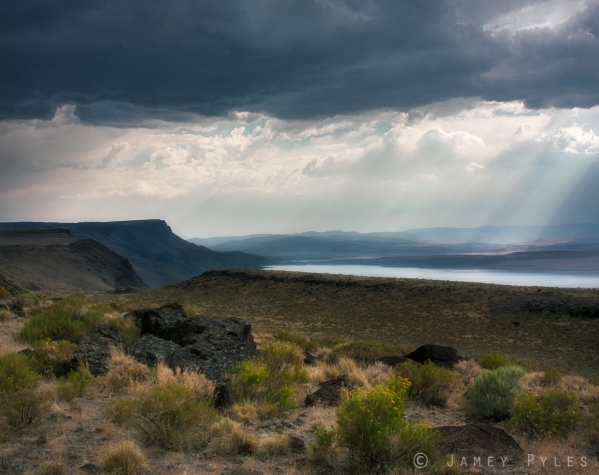 A wild storm threatens to break, fighting the piercing power of the sun over eastern Oregon's Basin and Range province